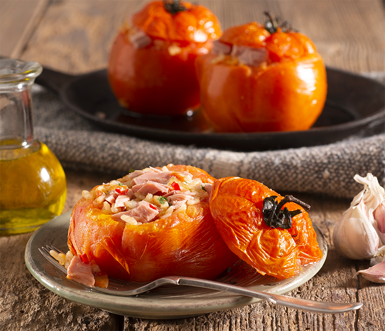 Tomatoes stuffed with rice and tuna with hot chili pepper